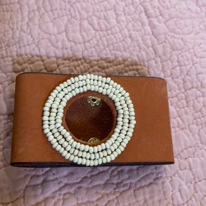 Leather cuff bracelet with beading and adjustable snap sizing ( see photos)